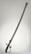 A WWI pattern Imperial German army sword, with brass guard, hilt and brass wire on a brass grip,