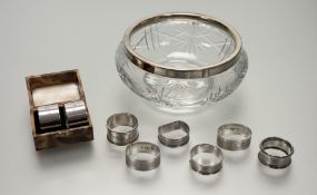 A collection of silver napkins to include a pair of Sheffield silver napkin rings: h. x 2.8cm d. x