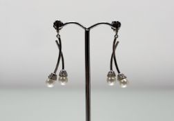 A pair of 18ct white gold drop earrings mounted two Chinese freshwater cultured pearls each set four