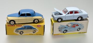 A Dinky Toys No. 168 Ford Escort in a light blue body with a red interior, bix in good conditon