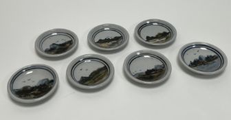 A collection of seven Highland Stoneware small trinket dishes, each decorated with Scottish
