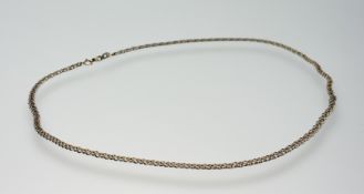 A 9ct gold kerb link chain necklace with ring fastening: l. x 27cm 9.19g