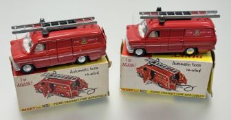 Dinky Toys two of the same models of a 286 Ford Transit Fire Appliance - metallic red body, silver