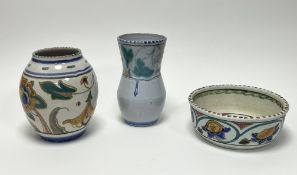 A collection of Honiton earthenware comprising a bulbous vase with polychrome foliate decoration (h.