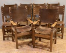 A set of ten 20th century oak and leather dining chairs, in the 17th century style, eight + two