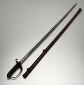 An 1822 pattern Infantry Officer's sword, the brass hilt with Victoria cypher, sharkskin grip,