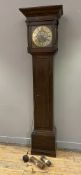 A late 18th century oak longcase clock, by Thomas Travis of Thorne, with moulded hood over brass