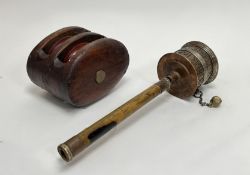 A Tibetan Buddhist prayer wheel in copper and brass, with wooden handle (l. 31.5cm), together with a