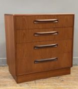 A mid-century teak chest of drawers by G-Plan, fitted with four graduated drawers to front raised on