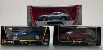 A Road Signature 1:18 car model of a 1961 Aston Martin DB4GT Zagto, a Burago die-cast metal model of
