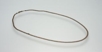 A 9ct gold kerb link chain necklace with ring fastening: l. x 23cm 5.35g