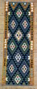 A hand-knotted Maimana kilim runner, central panel with repeating geometric motifs, navy ground