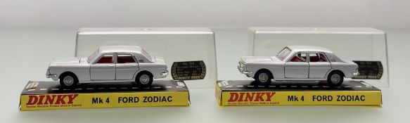 A pair of Dinky Toys Model No.164 Mk 4 Ford Zodiac both in a silver metallic body, both in