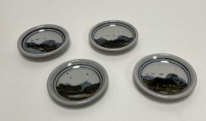 A collection of four Highland Stoneware small trinket dishes, decorated with Scottish loch and