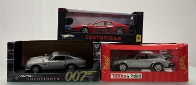 A boxed Autoart 007 James Bond Collection from Goldfinger Aston Martin D85 Bond Version RT Drive