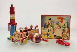 A collection of various vintage wooden children's toys comprising a Tri-ang Teachem Toys soldier