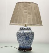 A 20thc Chinese blue and white scrolling chrysanthemum decorated ginger jar later converted table