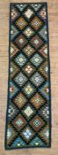 A hand-knotted Maimana kilim runner, central panel with repeating diamond-shaped motifs, moss