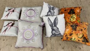 A mixed lot of cushions, including Jean Paul Gaultier fabric (8): Largest 50cm x 50cm