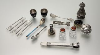 A collection of silver and white metal objects, including a pair of Norwegian sterling silver