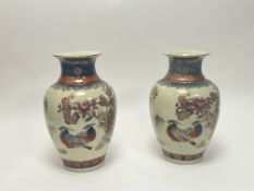 A pair of 20thC Japanese Satsuma vases decorated with chrysanthemums and birds on a craqualure-style