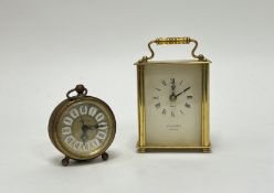 A Lionel Peck small brass Quartz carriage clock raised on four feet (h. 14cm), together with a