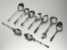 A collection of apostles and other spoons to include a late Victorian London silver boat terminal