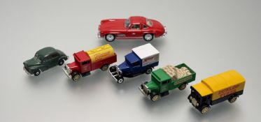 A collection of various collectable model cars comprising, a Corgi Toys Suttons Seeds Morris