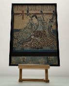 Utagawa Kunisada (Japanese 1786-1864), a seated Lady in a Kimono, woodblock print, in a glazed