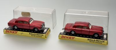 A Dinky Toys a pair of Rolls-Royce Silver Shadow in a metallic red body model no.158, in original