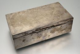 A Birmingham silver rectangular engine turned cigarette box with cedar lined interior and oak