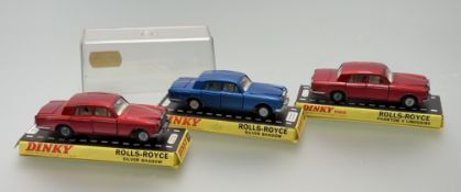 A trio of Dinky Toys car Rolls-Royce Silver Shadow models comprising one in a metallic blue body the
