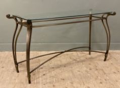 A modern metal-framed console table, with rectangular glass top raised on Art Nouveau-style shaped