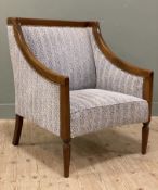 An Edwardian mahogany-framed armchair, French-style with straight back and curved arms,