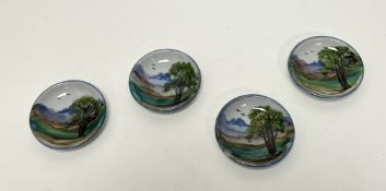 A collection of four Highland Stoneware small trinket dishes, each decorated with Scottish landscape