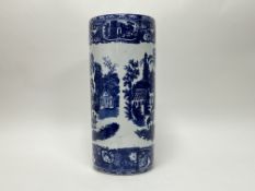 A 19thC Victoria Ware Ironstone blue and white umbrella stand decorated with a European town
