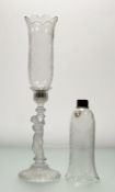 An Art Deco frosted glass candlestick holder, with moulded cherub figure to stem, (chip to base) (