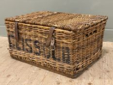A vintage wicker laundry basket/ hamper: H. 40cm L. 75cm D. 53cm