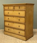 An Edwardian oak chest of drawers, fitted with two short over four graduated long drawers, with