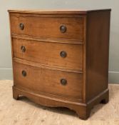 A reproduction mahogany bow front chest of drawers, fitted with three graduated drawers with brass