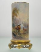 A Royal Worcester spill vase, shape no. 6 /161, raised pierced gilt scroll, the body painted with