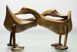 A hand-carved intertwined stained wooden duck sculpture figure. (h-26cm l-39cm)