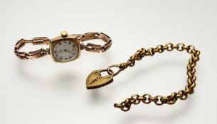 A vintage 9ct gold Coinor wristwatch with a champagne dial and arabic numerals and seconds dial