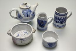 A collection Susan K Senior Scottish Studio Pottery with hand-painted butterflies / dragonflies in