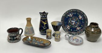 A selection of studio and terracotta pottery of various sizes including a hand painted vase in the