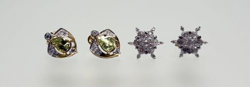 A modern pair of 9ct gold stud earrings set pear shaped peridot coloured faceted stones