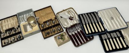 A cased set of six epns bean handled coffee spoons: l. x 10cm together with a cased set of six