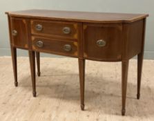 A reproduction inlaid mahogany sideboard, in the George III style, bow front over two central