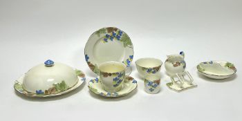 A Foley Fine Bone China breakfast service for one, decorated with Autumnal leaves and blue and