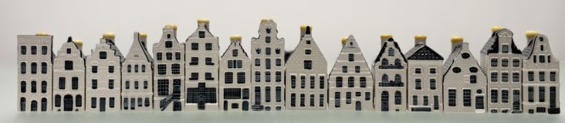 A collection of blue delft KLM house decanters comprising numbers - 31, 78 ,28 ,56, 50, 77, 26,